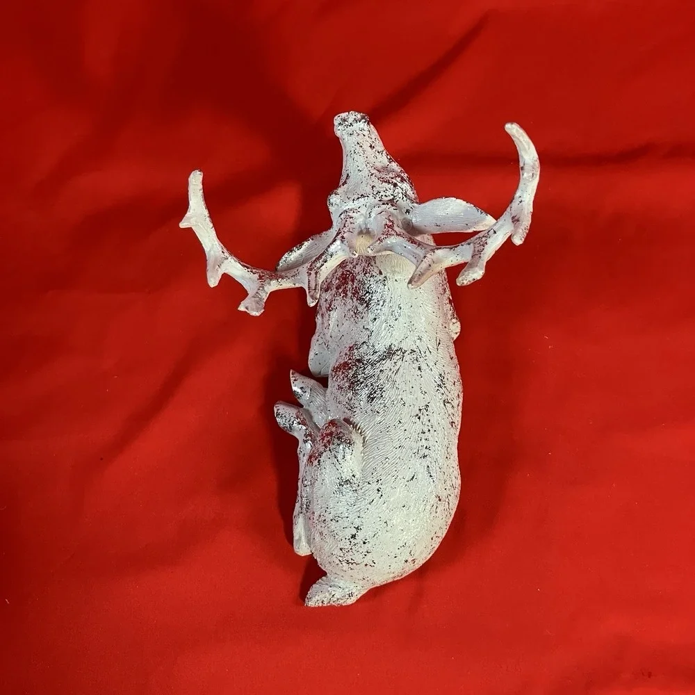 December Home reindeer laying